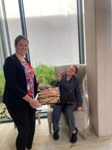 Julie delivering biscuits