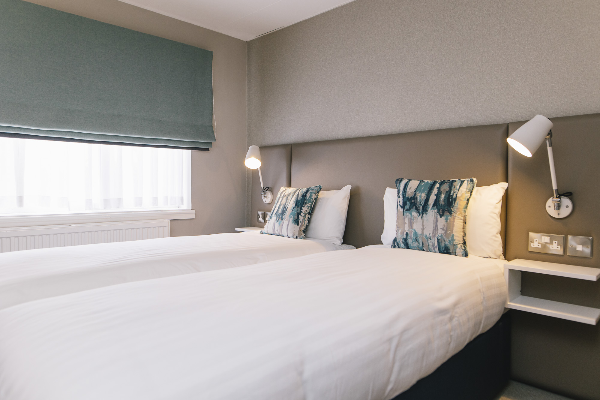 Two single beds in a bedroom