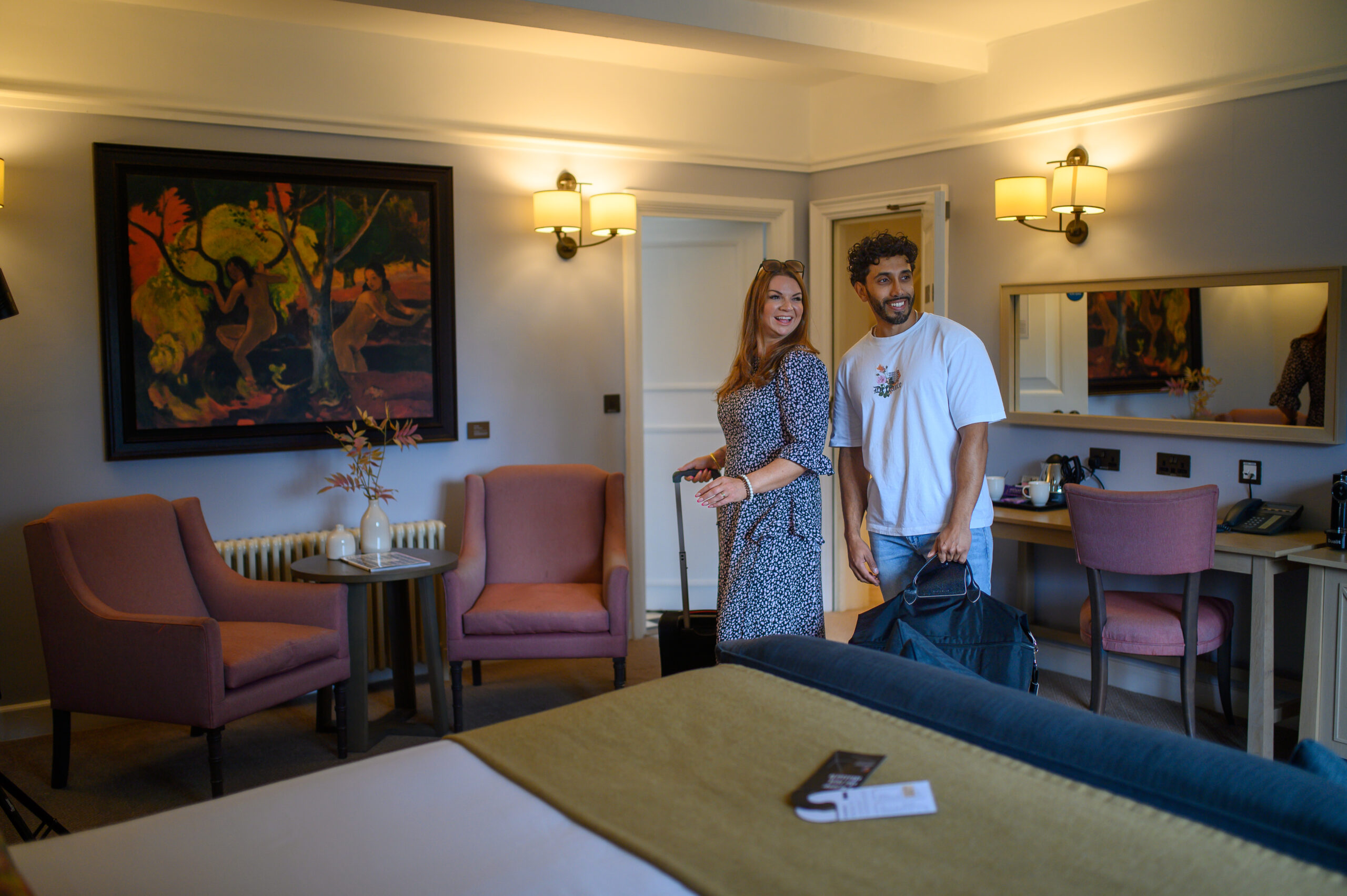 A couple in a deluxe room