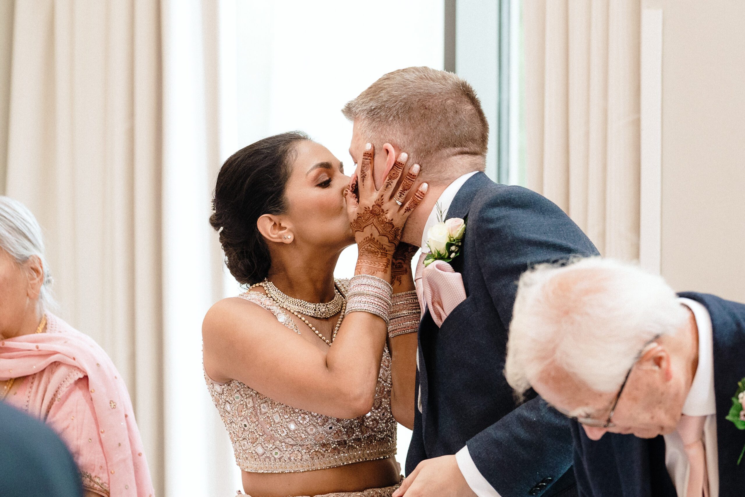 A bride and groom kissing