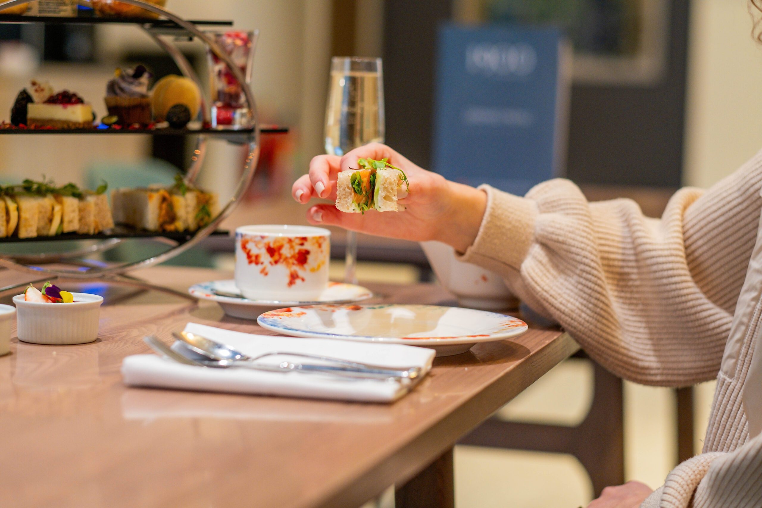 A guest tucking into afternoon tea