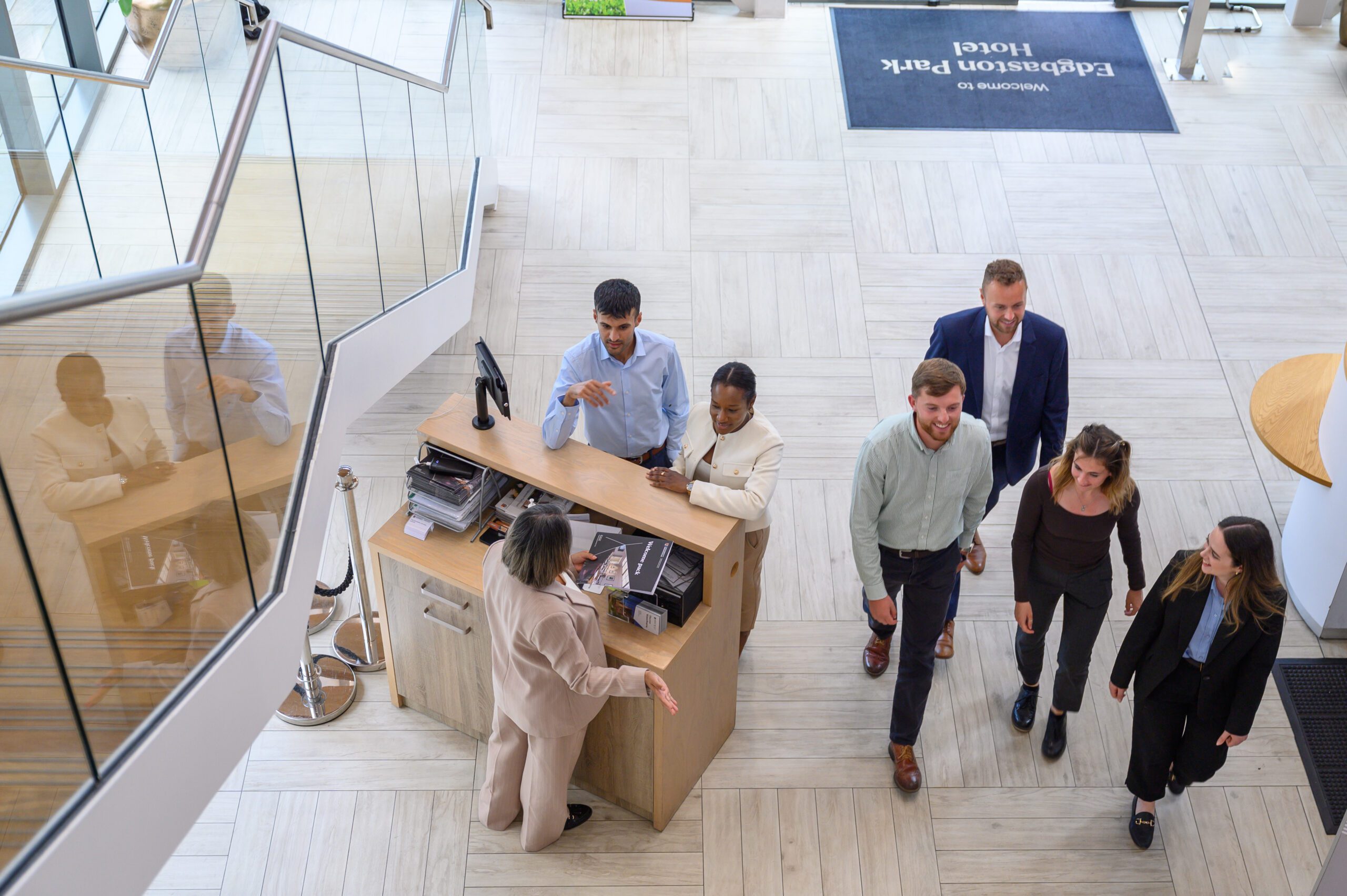People walking through reception